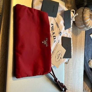 PRADA wristlet red